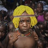 Velise wears the traditional beaded wigs called Ena meant for girls of the Mudimba tribe