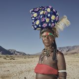 Mbawiramo, 37, is a members of a group from the Zimba tribe, who are migrating from Angola to Namibia across difficult parched Namibian landscape.