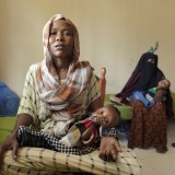 Fawsiyo and her 6 month old child Mowlid, suffering from malnutrition