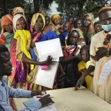 Refugees queue for aid from a charity in Maban, South Sudan.